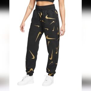 NWT Nike Women's Black and Gold Joggers Allover Print